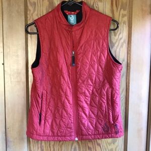 Isis brick red vest size 8. Fleece lined, side pockets.